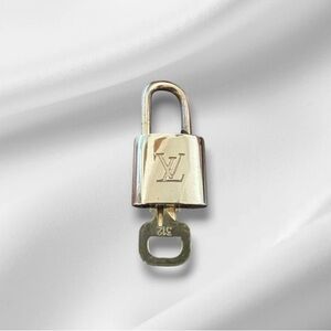 Louis Vuitton Gold Key & Card Holder Accessory